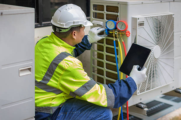 Professional Hvac technician working in Calverton, MD